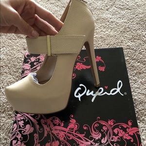 New, never worn, heels